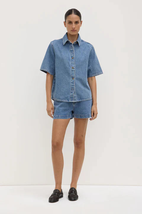 Model wearing denim shirt 